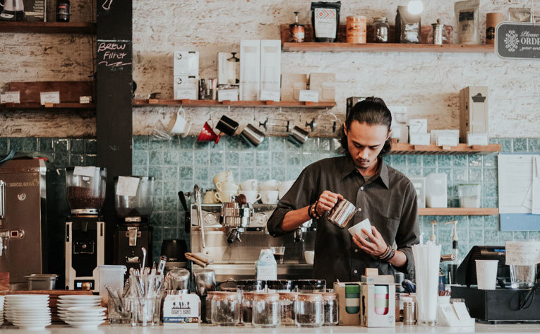 Barista making coffee image