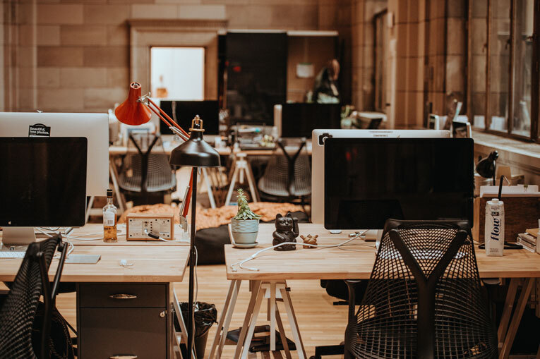 Office desk with computers image