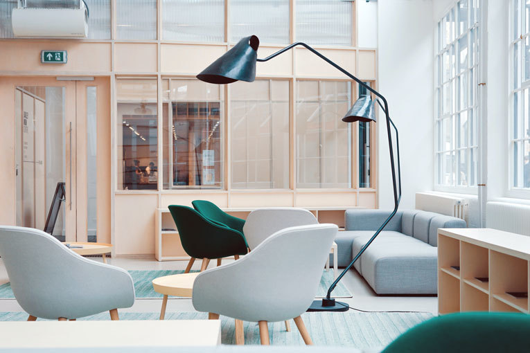 Office reception area with sofas and chairs image