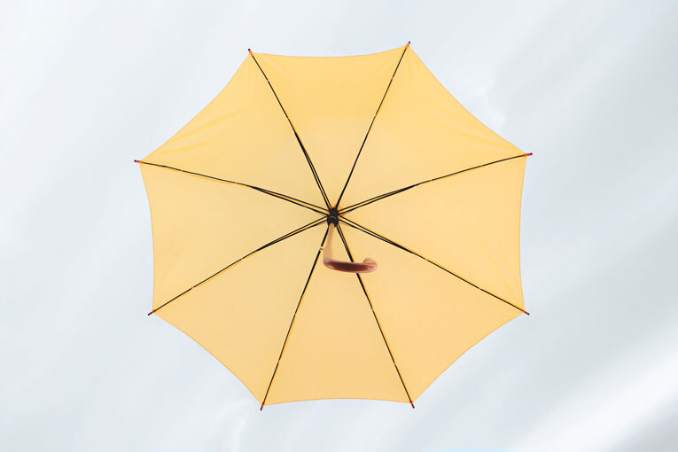 Open yellow umbrella image